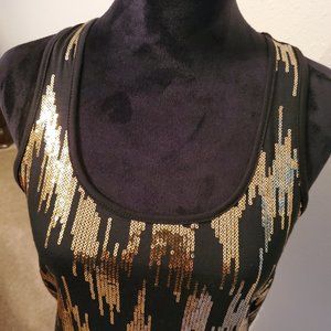 Glittery tank top women's black and gold made in USA size L. 100% polyester.